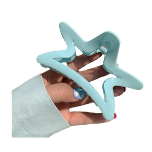 Star-shaped mint blue hair claw clip with glossy finish for elegant women hairstyles