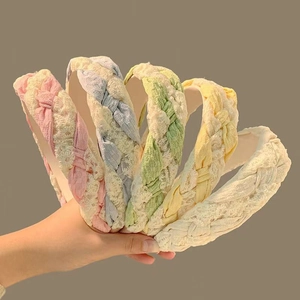 Five-piece set of lace braided headbands in pastel colors for a stylish hair accessory look