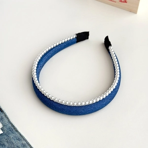 Elegant double-layered dark blue denim headband with white pearls for a high top hairstyle