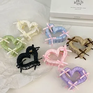 Lot de 7 pinces à cheveux en forme de cœur avec nœuds en ruban couleurs variées