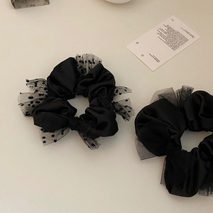Elegant set of two black satin scrunchies with polka dot mesh and ruffled lace detailing