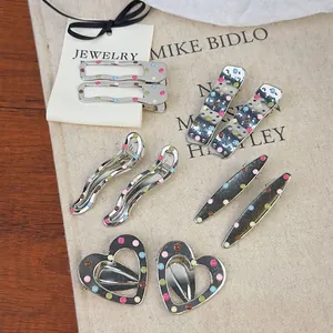 Barrettes à cheveux chic en métal argenté avec des pois colorés de formes variées
