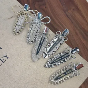Ensemble de barrettes à cheveux argentées à nœud papillon en métal avec strass brillants