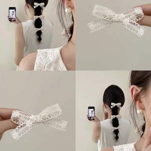 Three-piece white lace bow hair clips set for elegant French style hair styling
