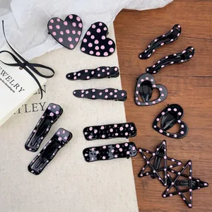 Pink polka dot metal hair clips set in heart and star shapes for women and girls