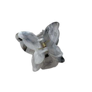Elegant butterfly hair claw with grey and white marble texture resin on white background