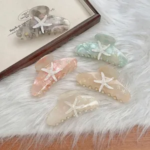 Starfish hair clips set in mint green, pink, and marble acetate colors for summer
