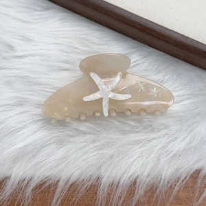 Starfish hair claw clip with marble texture and glitter starfish decorations for summer