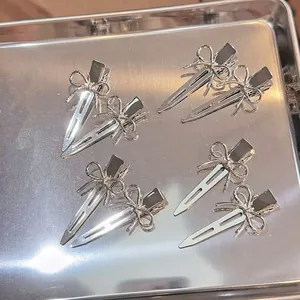 Pince à Cheveux Nœud Papillon en Métal Minimaliste de Style Coréen pour Femmes Doux Argent Alliage Pince Bec de Canard Bijoux de Cheveux