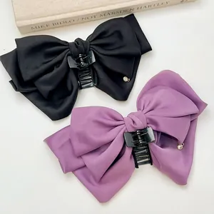 Elegant multi-layer satin bow hair claw clip with pearl pendant in black and purple