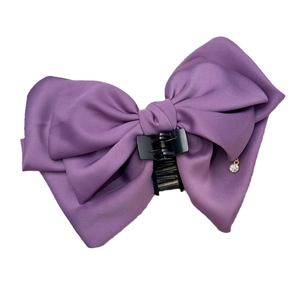 Elegant purple satin multi-layer bow hair clip with a sparkling rhinestone pendant
