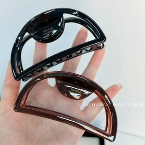 Minimalist large acetate hollow half-round hair claws in black and amber brown colors