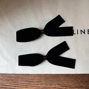 Elegant pair of black velvet bow hair clips for women in French vintage minimalist style