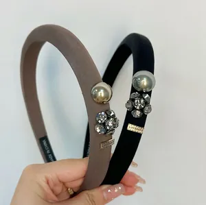 Luxe sponge headband with rhinestones and gold metal accents in mocha brown and black