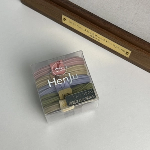 Set of five durable high-elastic hair ties in macaron colors in a clear square gift box