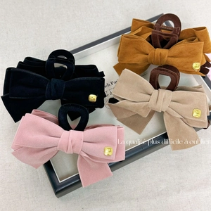 Vintage velvet bow shark clips in black and brown with elegant gold metal buckles
