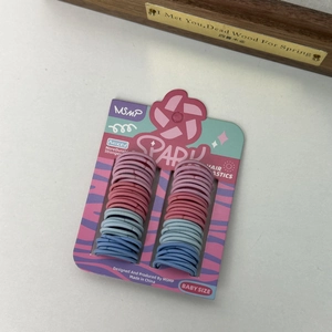 Detailed view of high-elasticity hair ties in gradient pink and blue colors for girls