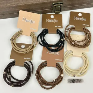 Lot de 5 chouchous élastiques avec perles dorées aux tons terreux pour un maintien durable