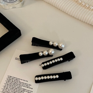 Elegant French velvet hair clips with pearl bead accents, set of four boutique hairpins