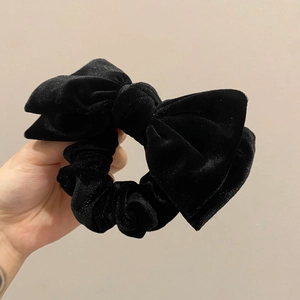 Elegant vintage black velvet hair scrunchie with large bow design for women