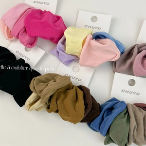 Set of 4 soft high-elastic wide fabric hair scrunchies in assorted solid colors on cards