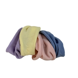 Set of four soft high-elastic hair ties in purple, yellow, pink, and blue colors