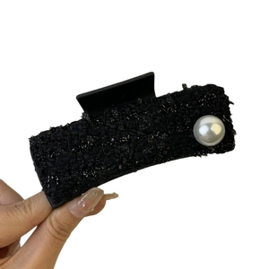 Elegant tweed hair claw clip with large pearl accent for women's bun hairstyles