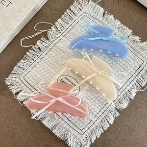 Set di 3 mollette per capelli in resina opaca con fiocchi in azzurro, crema e rosa