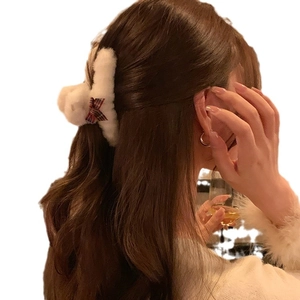 Large plush shark hair claw clip with a red and blue plaid bow for women hair styling