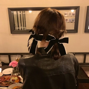 Elegant black velvet hair bows with white lace trim for pigtail hairstyles