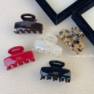 Classic acetate square hair claws in five colors with golden France lettering detail