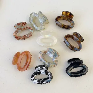 French retro acetate hair clips in various marble patterns for elegant hair styling