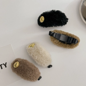 Set of 4 plush faux fur hair clips in black, khaki, beige, and coffee colors