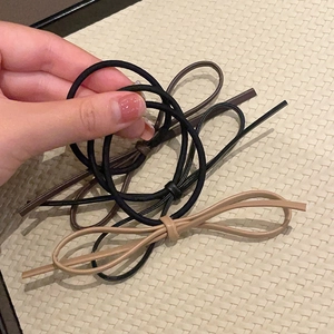 Simple elastic bow hair ties in multiple colors like black and beige for women