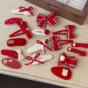 Festive red plush bow hair clips and flower hairpins set for girls and kids