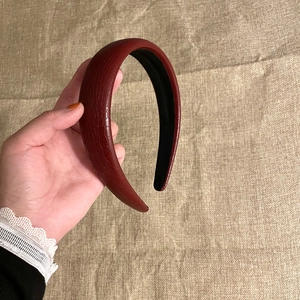 Padded wine red headband with crocodile texture leather and wide high top design