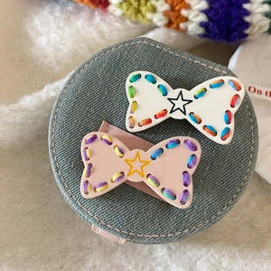 Handmade leather bow hair clips with star print and colorful knit borders for girls