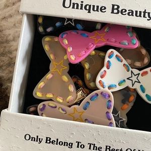 Cute colorful knitted bow hair clips for girls in a gift box with star patterns