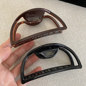 French vintage large acetate claw clips in amber brown and black with gold handmade logo