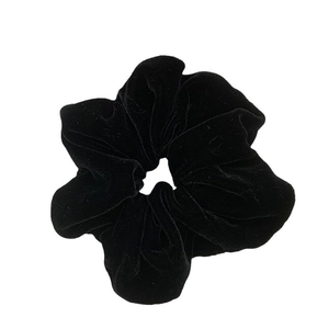 Elegant black velvet scrunchie for women with premium pleated silk texture and floral shape