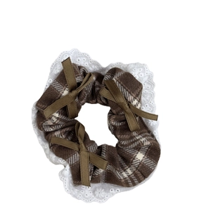 Vintage plaid scrunchie with white lace edges and three brown satin bows for hair styling