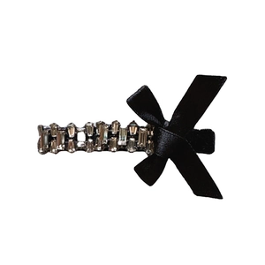 Vintage black velvet bow hair clip with sparkling rhinestones for elegant styling