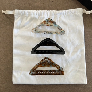 Three-piece set of geometric triangle acetate hair claws in marble and tortoiseshell patterns