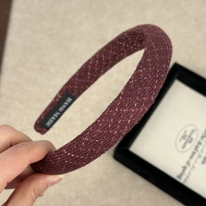 Retro burgundy plaid headband with gold label and thick tweed fabric texture for women