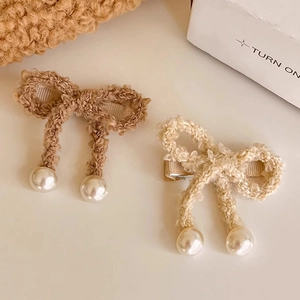Cute lamb wool bow hair clip with pearl pendants in brown and beige colors