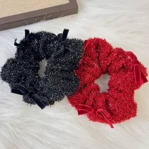 French tweed scrunchies with velvet bows in black and red for winter hairstyles
