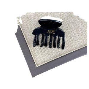 Elegant black acetate hair claw clip with golden Barrette La France lettering