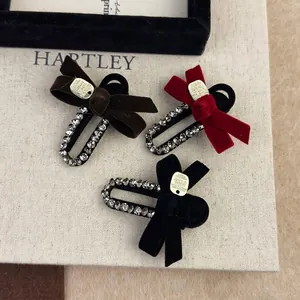 Three-piece velvet bow hair clips with rhinestones in wine red, coffee, and black colors