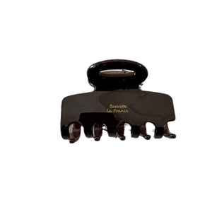 Small square tortoiseshell acetate hair claw clip with gold France label for women