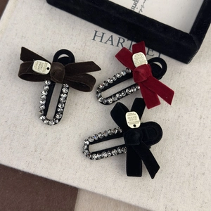 Vintage velvet bow hair clips with rhinestones in brown, dark red, and black colors